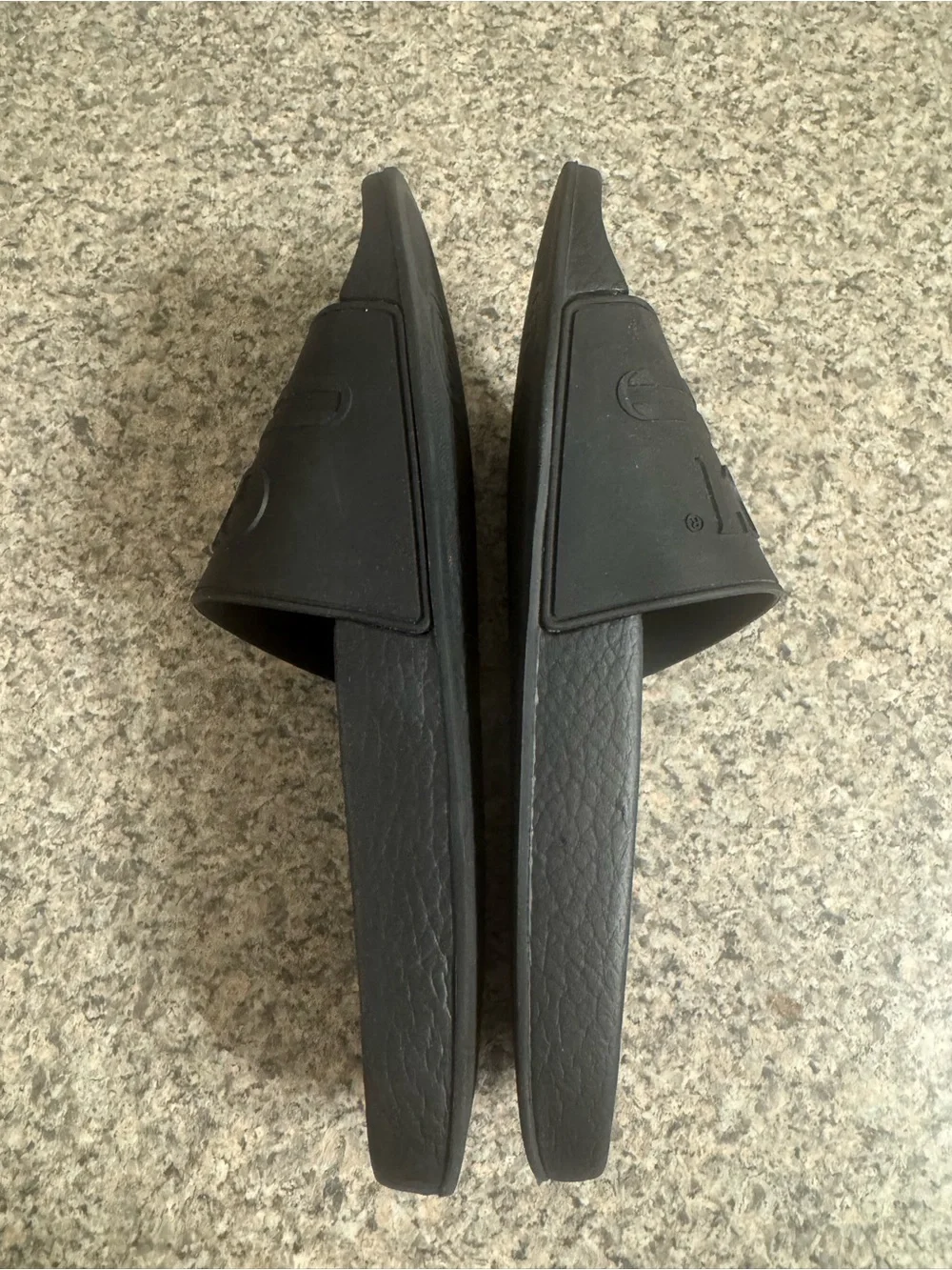 Gucci Black Embossed Logo Slide Sandals